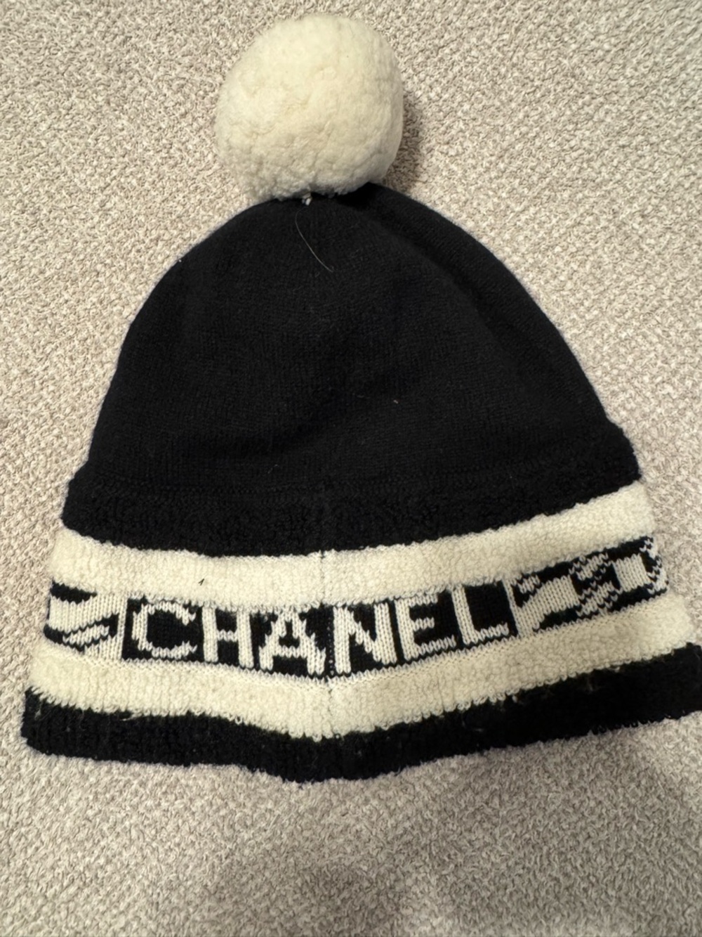 CHANEL Black and Cream Pom-Pom Logo Knit Beanie